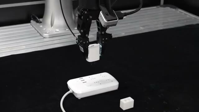 TacPAC: charger-plug insertion demonstration; open the paper